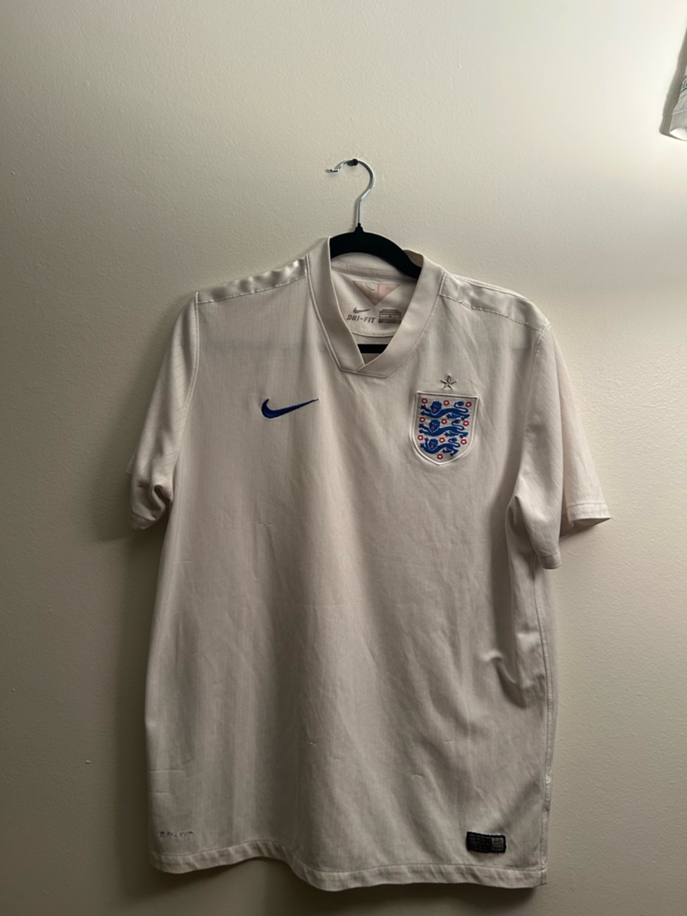 Nike England Men's White Football Jersey with Blue Swoosh